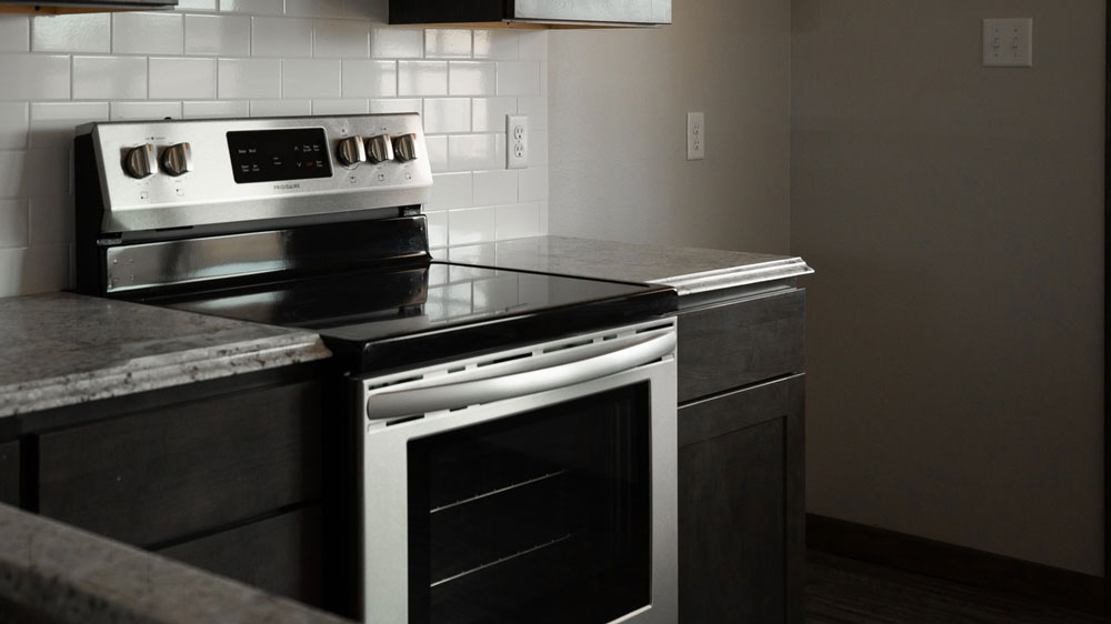 An oven in a clean kitchen